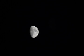 waxing gibbous moon on the sky