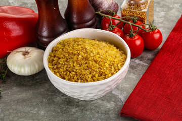 Dry wheat bulgur cereal heap