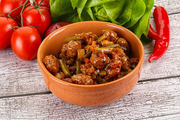 Meatball with vegetables and spices
