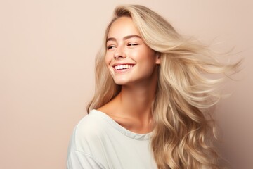 Beautiful smiling girl with blond hair. Stylish hairstyle curls done in a beauty salon. Happiness, self care, mental health idea