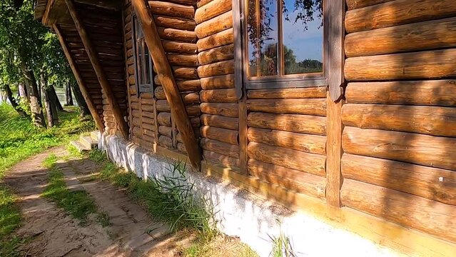 Fisherman's house on a tiny island in the middle of the lake on summer. Old Solotvyn village, Ukraine.