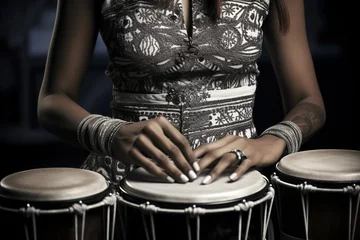 Fotobehang Close up of hands of a woman playing a drum. Black-white © Leoarts