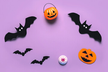 Halloween concept background. Top view of pumpkin basket,halloween pumpkin,and vampires with space for text. Halloween party decoration concept