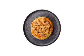 Pilaf or pilau with chicken, traditional uzbek hot dish of boiled rice and chicken meat