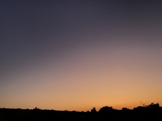 Dramatic Sunset in the Mountains with a Colorful Sky in the Background