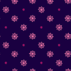 Seamless pattern of winter snowflakes on a pink background