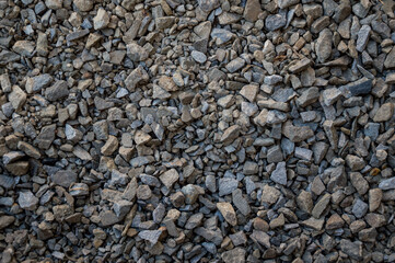 Gray crushed stone, top view.