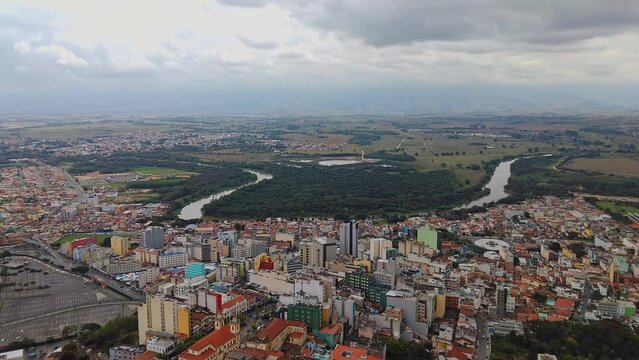Drone view of Aparecida with Paraíba river.