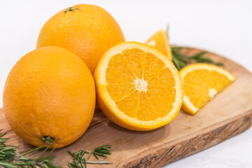 Navel oranges on cutting board