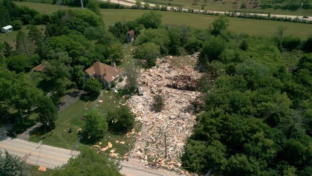 destroyed single family home, property totally damaged by propane leak disaster. above shot