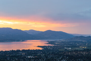 Kelowna at sunset. View of Kelowna from Kuiper's Peak Mountain Park.