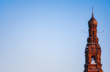 tower of the cathedral in kazan russia on sky background