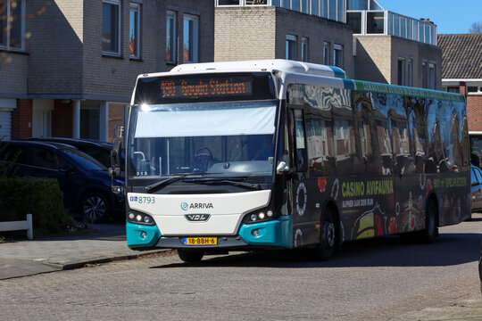 White and green bus of Arriva between Gouda and Rotterdam in Nieuwerkerk
