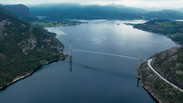 Aerial shot Lysefjordbrua bridge in Western Norway. Huge transportation suspension bridge crossing over Lysefjord fjord 