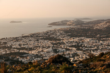view of the coastal city at sunset from the top of the mountain