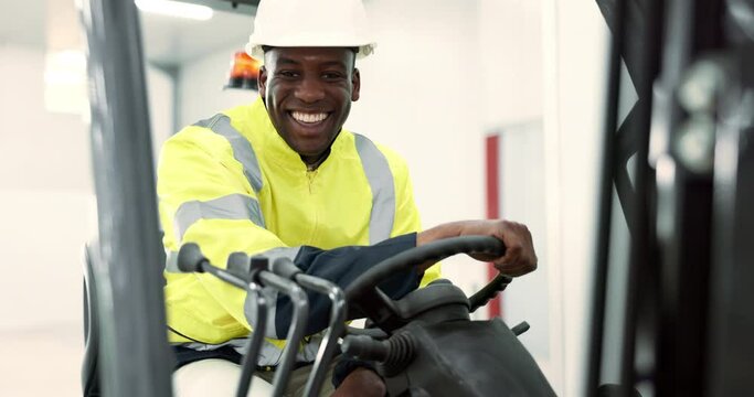 Black man face, engineering and driving on forklift for building and construction project. Happy, warehouse employee and smile for renovation, industrial and factory transport on site for work
