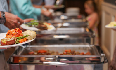 hand delicately savoring food, representing the joy and sensory pleasure of culinary indulgence