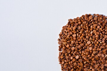 Iris seeds on white background.