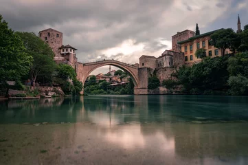 Foto op Plexiglas Stari Most The landscape of Mostar the old bridge with river Neretva Bosnia and Herzegovina.