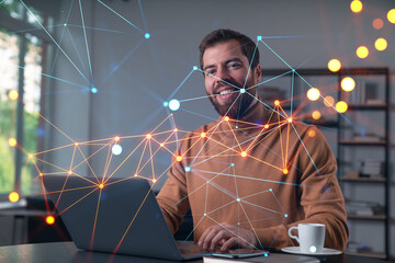 Thoughtful businessman in casual wear typing on laptop at office workplace. Concept of distant work, business, internet surfing, information technology. Social network hologram