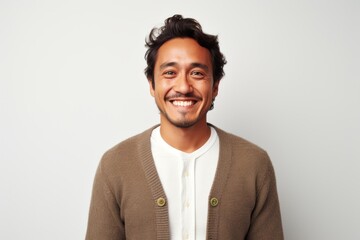 Fototapeta premium Portrait photography of a Peruvian man in his 30s against a white background