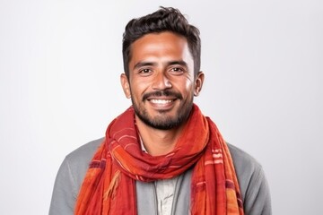 Obraz premium Medium shot portrait photography of a Peruvian man in his 30s wearing a foulard against a white background