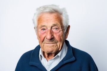 Portrait photography of a French man in his 90s against a white background