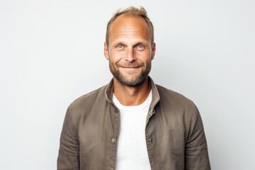 Portrait photography of a Swedish man in his 40s against a white background