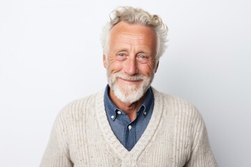 Medium shot portrait photography of a Swedish man in his 60s against a white background