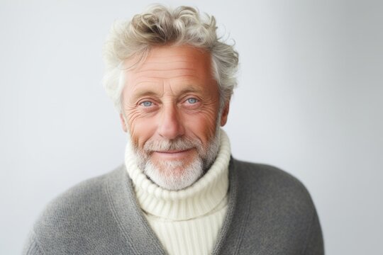 Medium Shot Portrait Photography Of A Swedish Man In His 60s Against A White Background