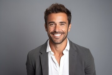 Medium shot portrait photography of a cheerful French man in his 30s against a minimalist or empty room background