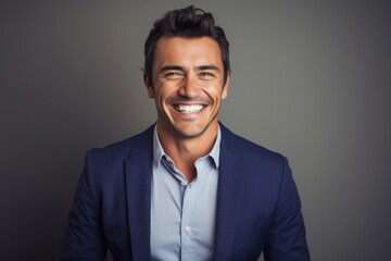 Lifestyle portrait photography of a cheerful Colombian man in his 30s against a minimalist or empty room background