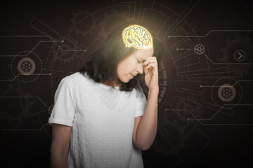 Memory. Woman with illustration of brain trying to remember something on black background with...