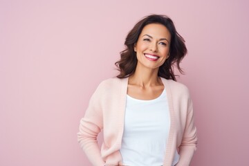 Portrait photography of a cheerful Peruvian woman in her 40s against a pastel or soft colors background