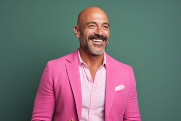 Fototapeta premium Group portrait photography of a cheerful Italian man in his 40s against a pastel or soft colors background