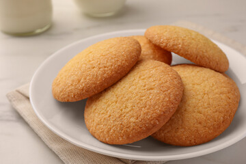 Delicious Danish butter cookies on white marble table, closeup