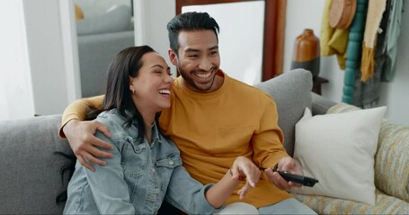 Couple, smile and watch movies on tv, news and cable show for media broadcast on sofa at home. Happy man, woman and people change television remote for streaming multimedia, subscription and comedy
