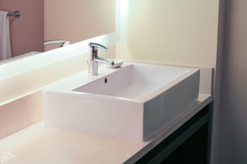 Fototapeta na wymiar Modern interior with clean white rectangular bathroom sink