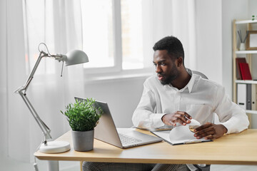 man african american student computer office freelancer smiling online education job laptop