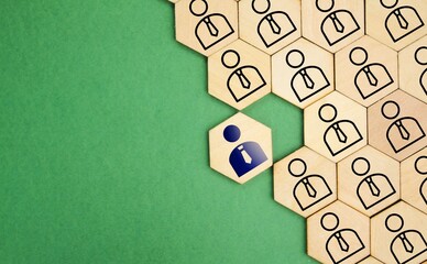 hexagon with the icon of adding new employees or students. Hand adding a new team member to a...