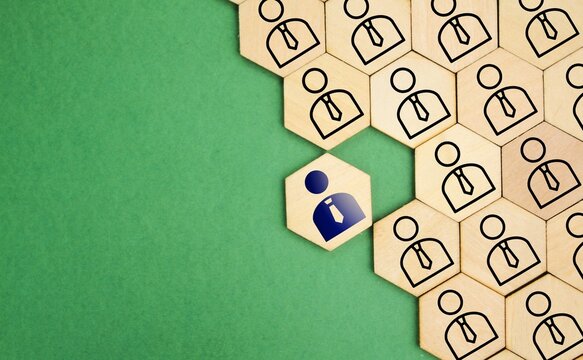 hexagon with the icon of adding new employees or students. Hand adding a new team member to a group. Business management concept