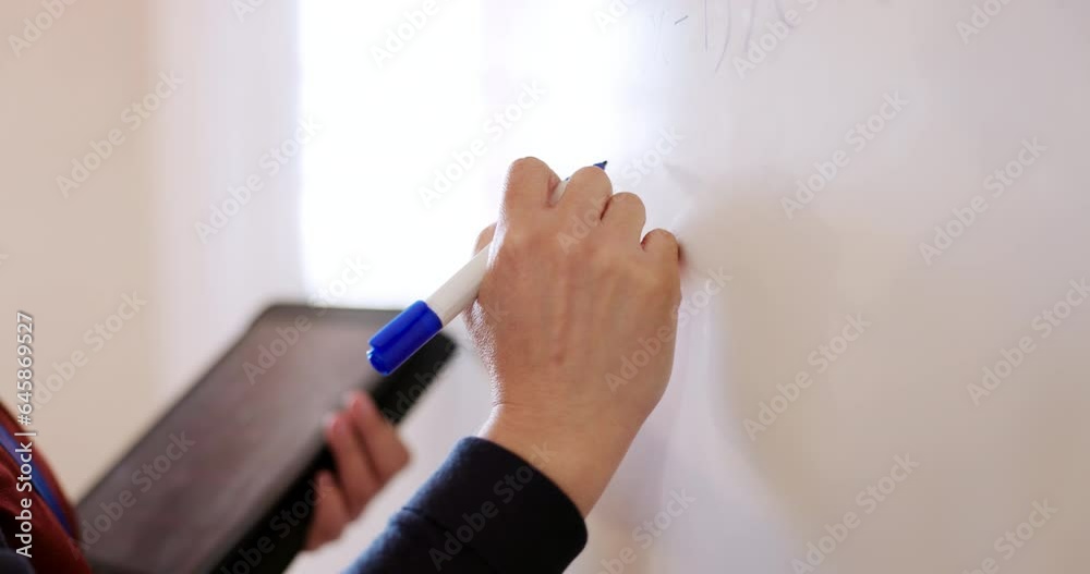 Poster whiteboard, tablet and teacher hands writing in a classroom with information from tablet for educati