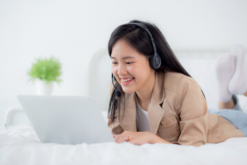 Young asian woman using laptop computer for video conference distance with online to friends, businesswoman working with video call for meeting with social network, business and communication concept.