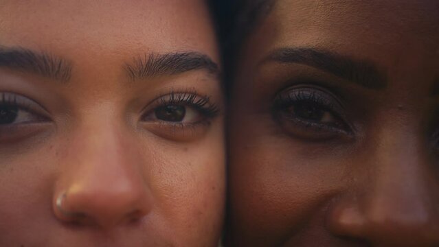 Close Up Portrait Showing Eyes Of Mature Mother With Teenage Daughter Face To Face - Shot In Slow Motion