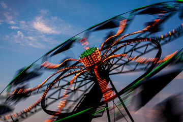 Amusement Rides with Movement Blur at the local County Fair, USA