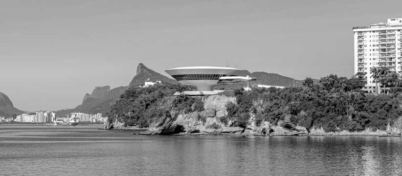 Photo of the Niterói Contemporary Art Museum - Rio de Janeiro, Brazil in black and white. This tourist spot is a project by Brazilian architect Oscar Niemeyer.