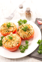 baked tomato with crumbs, spices and herbs