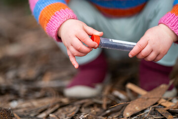 child doing science, toddler with test tubes outside in natural