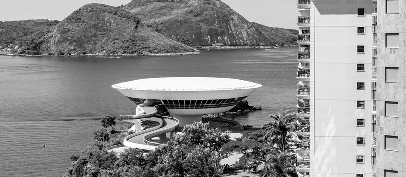 Photo of the Niterói Contemporary Art Museum - Rio de Janeiro, Brazil in black and white. This tourist spot is a project by Brazilian architect Oscar Niemeyer.