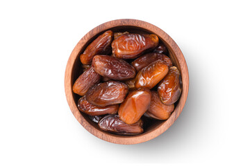 Date fruit in a wooden bowl isolated